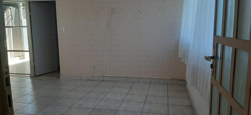 Prédio com 3 imóveis bairro de Lourdes